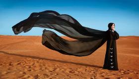 Tolkning av å se å ha på seg en abaya i en drøm av Ibn Sirin