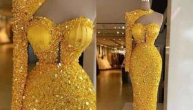 الفستان الذهبي في المنام وتفسير حلم شراء فستان للعزباء